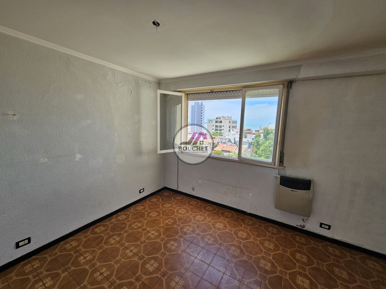 VENDO DEPARTAMENTO 2 AMBIENTES CON DEPENDENCIA LATERAL